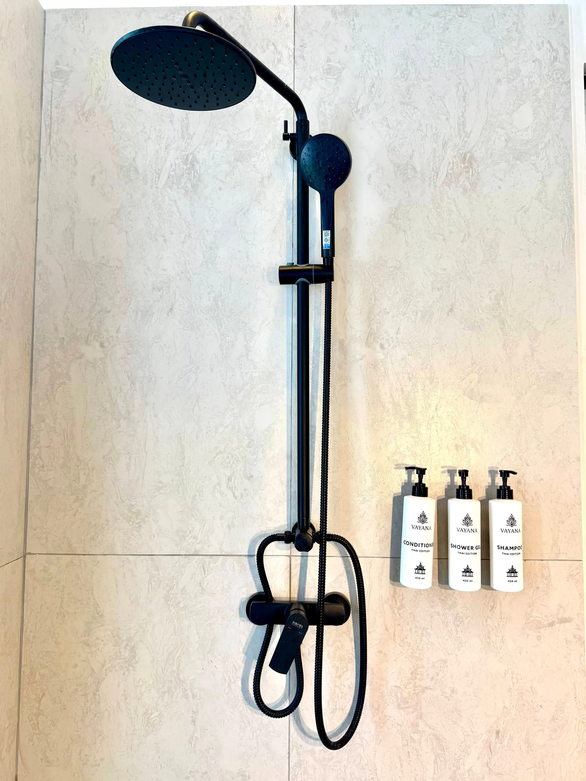Villa I — rain shower head with toiletries provided