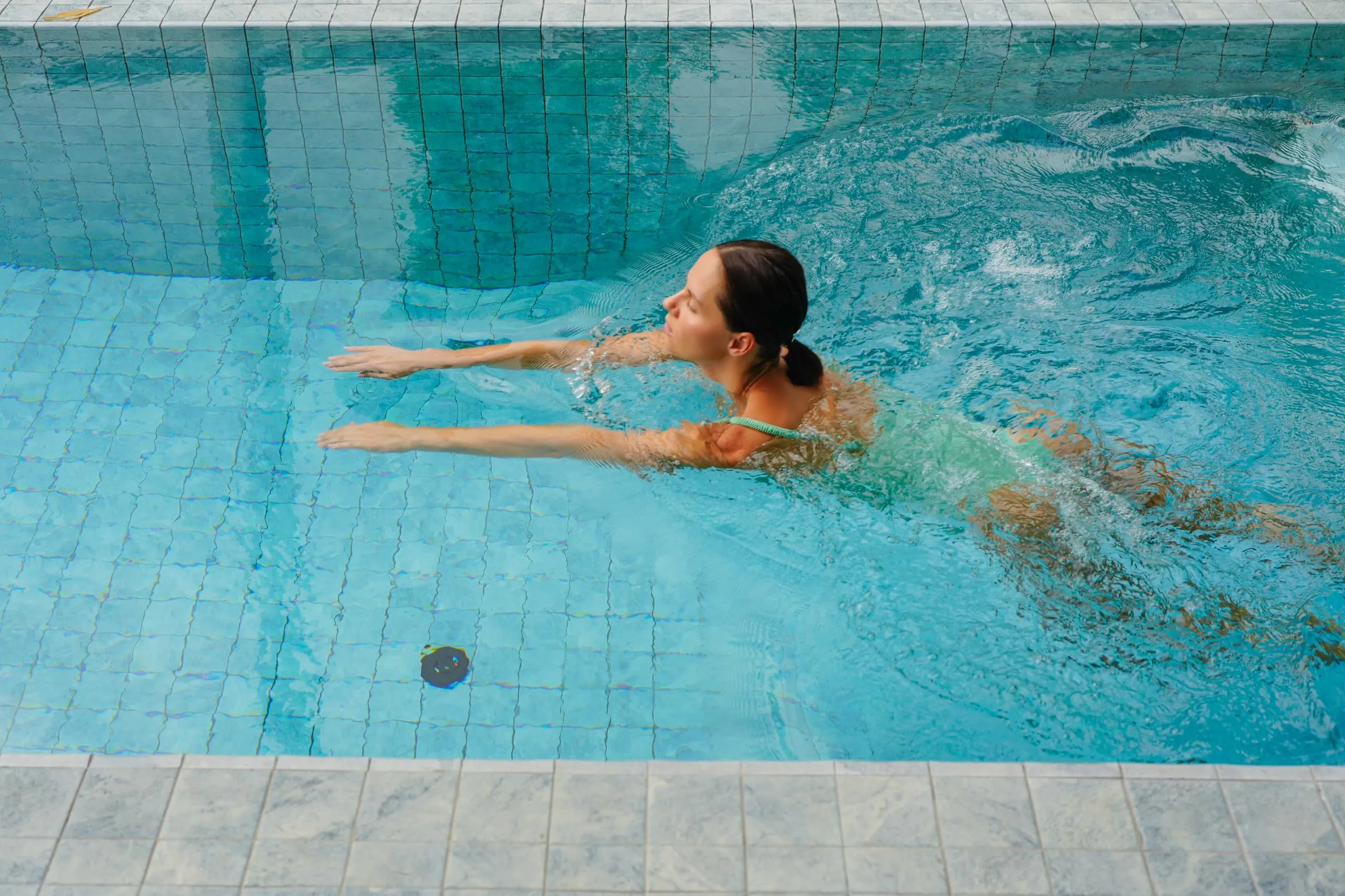Villa II — swimming in the turquoise-tiled pool