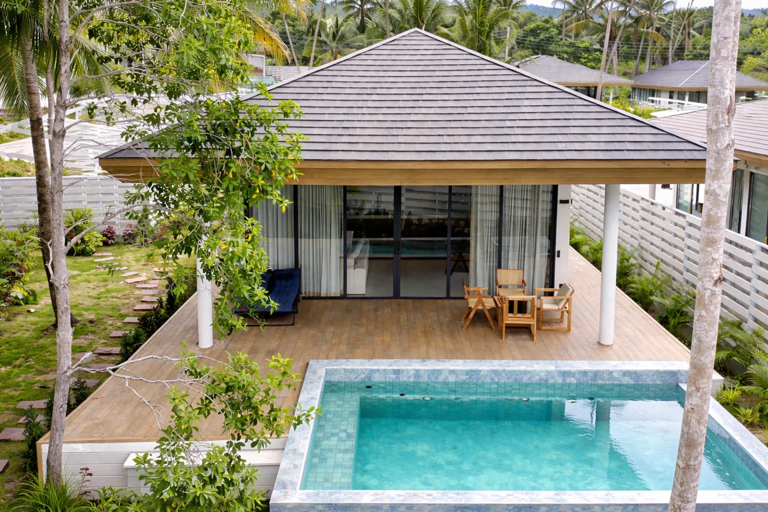 Villa II — aerial view of the villa, private pool and green hills
